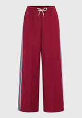 Pantaloni jogger cu croi larg și bandă laterală
