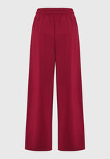 Pantaloni jogger cu croi larg și bandă laterală