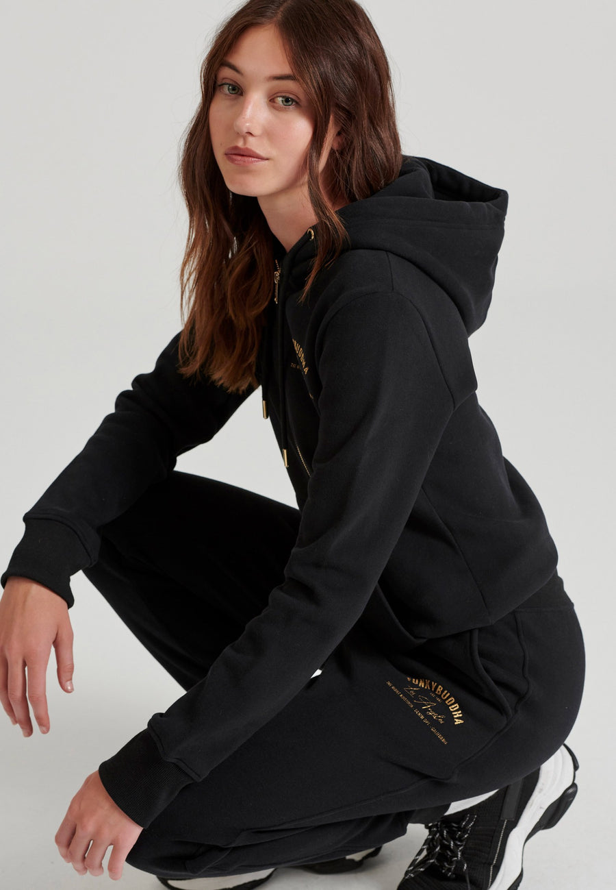 Pantaloni jogger de damă cu imprimeu pe coapsă