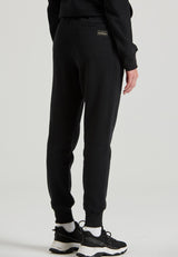 Pantaloni jogger de damă cu imprimeu pe coapsă