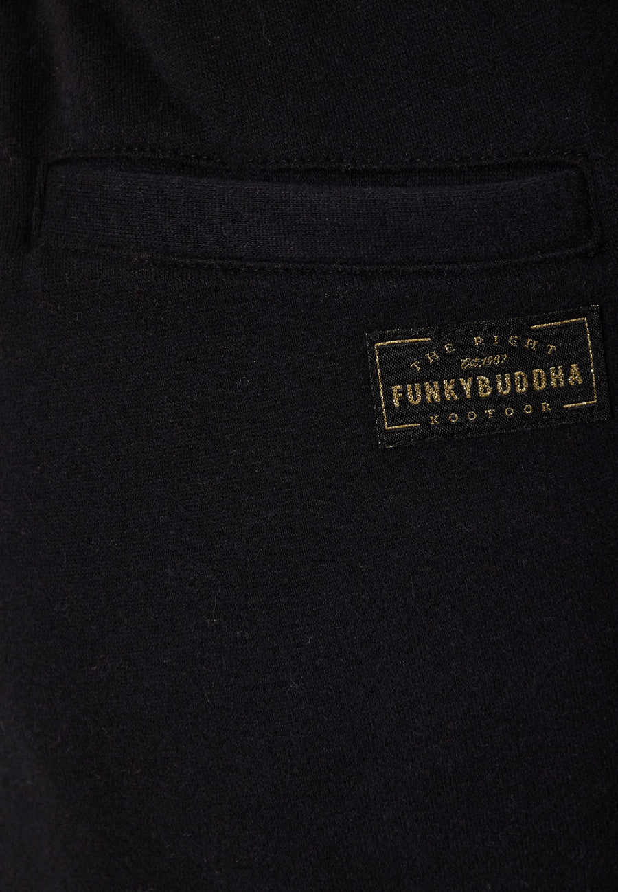 Pantaloni jogger de damă cu imprimeu pe coapsă