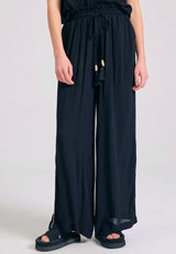 Loose fit artificial silk trousers - Black