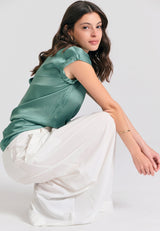 Lyocell blend pants with asymmetrical clasp - White