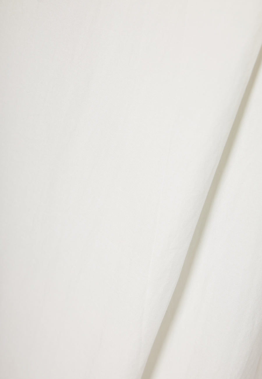 Lyocell blend pants with asymmetrical clasp - White