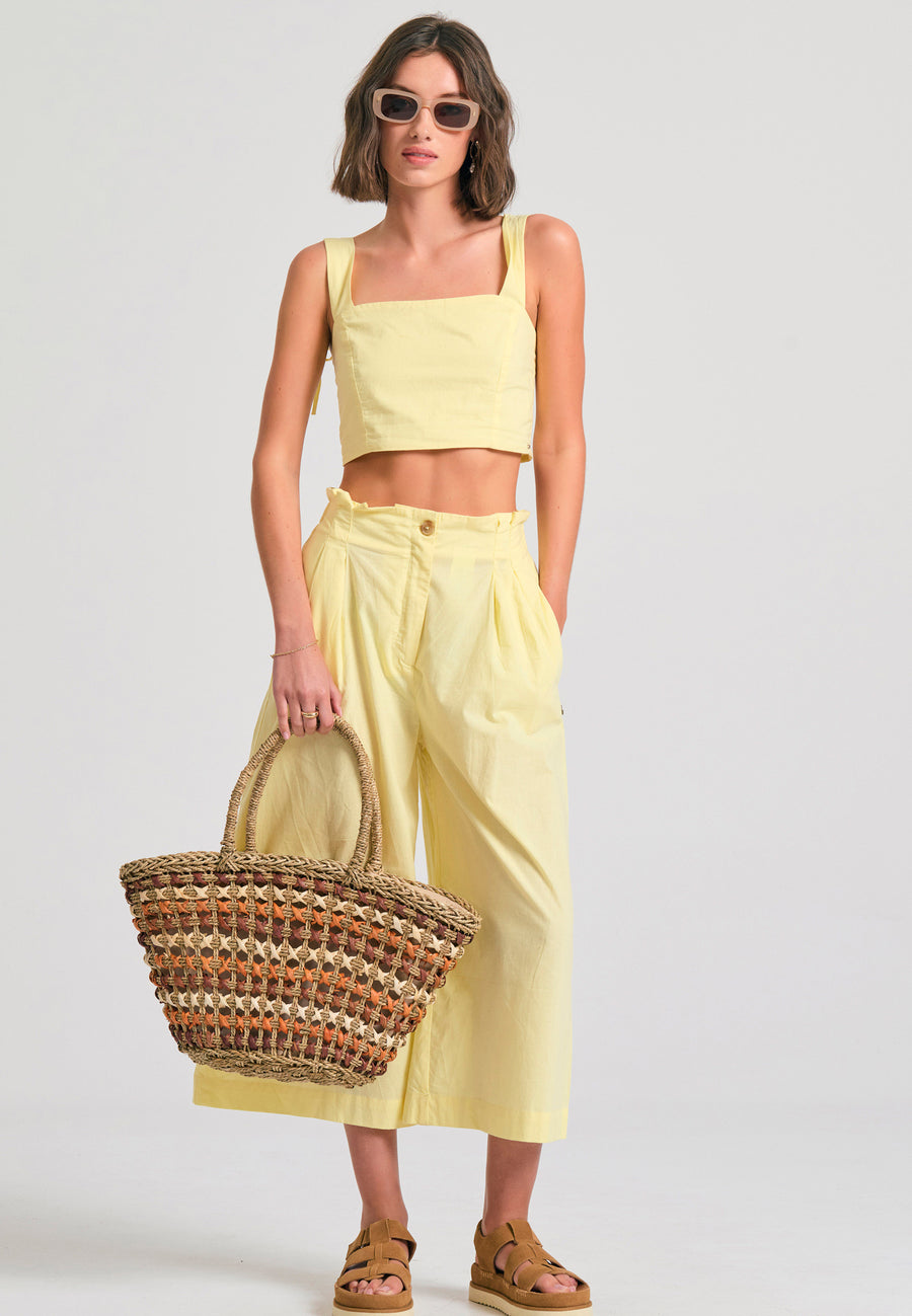 Loose fit pants with pleats on the waist - Lemon drop