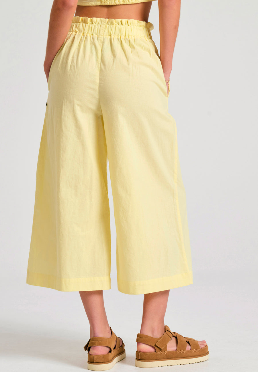 Loose fit pants with pleats on the waist - Lemon drop