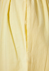 Loose fit pants with pleats on the waist - Lemon drop