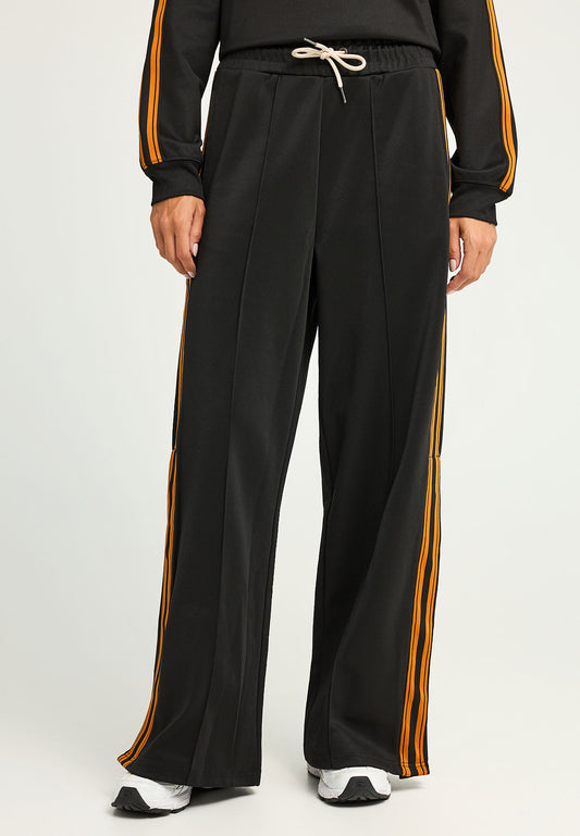 Pantaloni jogger cu croi larg și bandă laterală