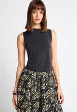 Sleeveless top with high neck