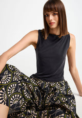 Sleeveless top with high neck