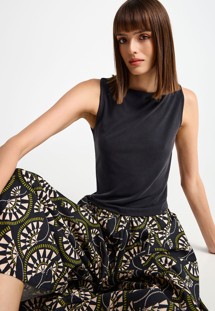 Sleeveless top with high neck