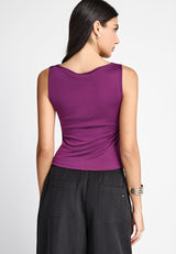 Sleeveless top with high neck