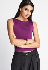 Sleeveless top with high neck