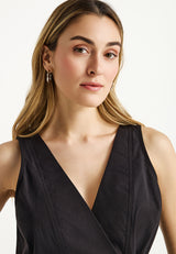 Women's wrapped top with ruffle hem