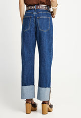 Pantaloni de damă din denim, cu manșetă la tiv