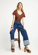 Pantaloni de damă din denim, cu manșetă la tiv