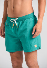 Men's plain swim shorts with decorative pocket - Carribean green