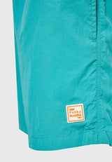 Men's plain swim shorts with decorative pocket - Carribean green