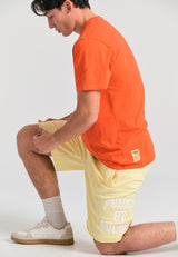 Wide leg fit sports shorts with branded print - Lemon drop