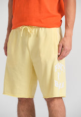 Wide leg fit sports shorts with branded print - Lemon drop