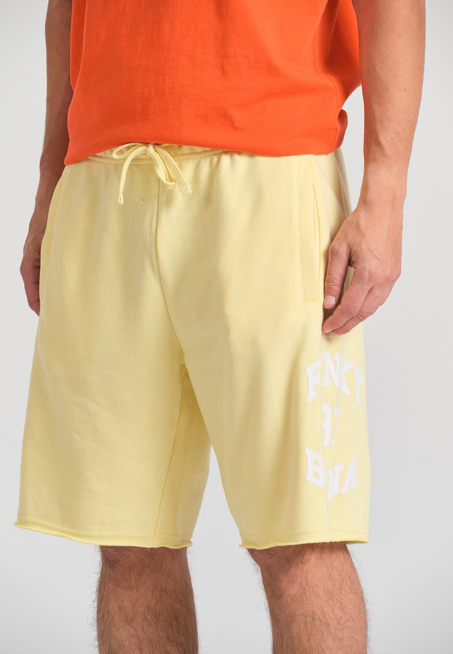 Wide leg fit sports shorts with branded print - Lemon drop