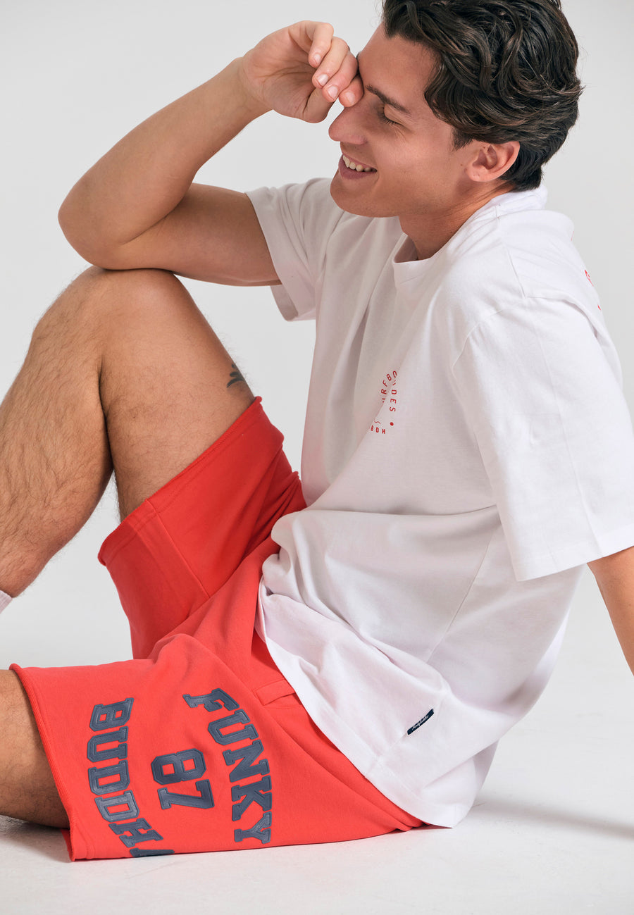 Wide leg fit sports shorts with branded print - Tomato