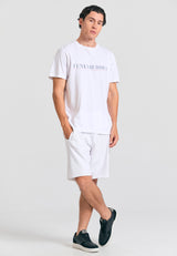 Wide leg fit sports shorts with branded print - White
