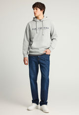 Blugi cu croială dreaptă și efecte spălate