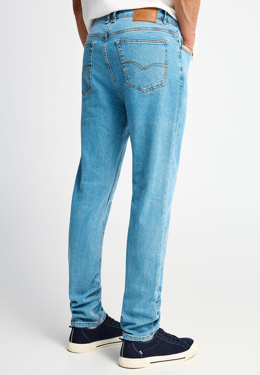 Men's slim tapered jeans with washed effects
