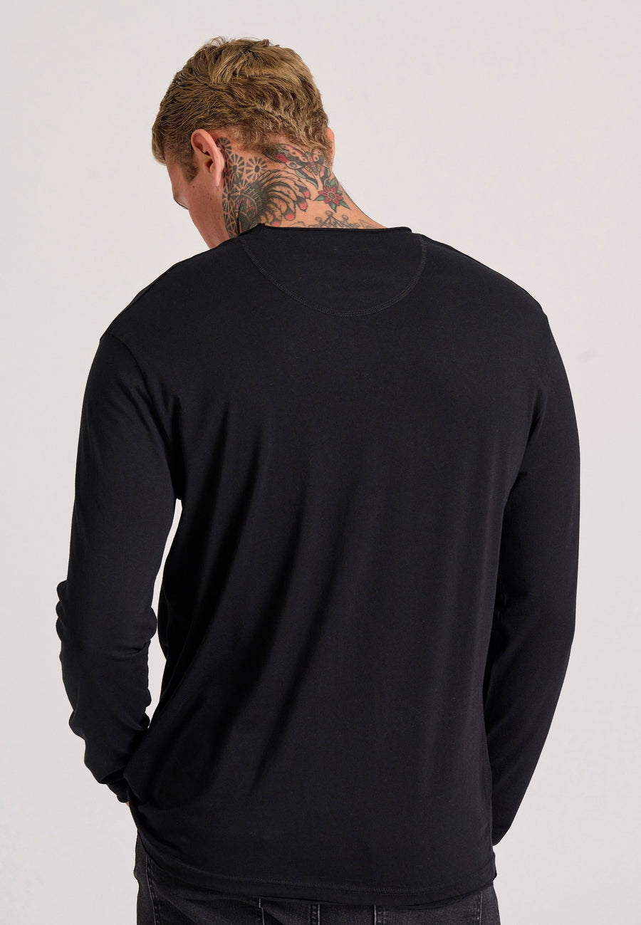 Tricou cu croială lejeră și margini brute